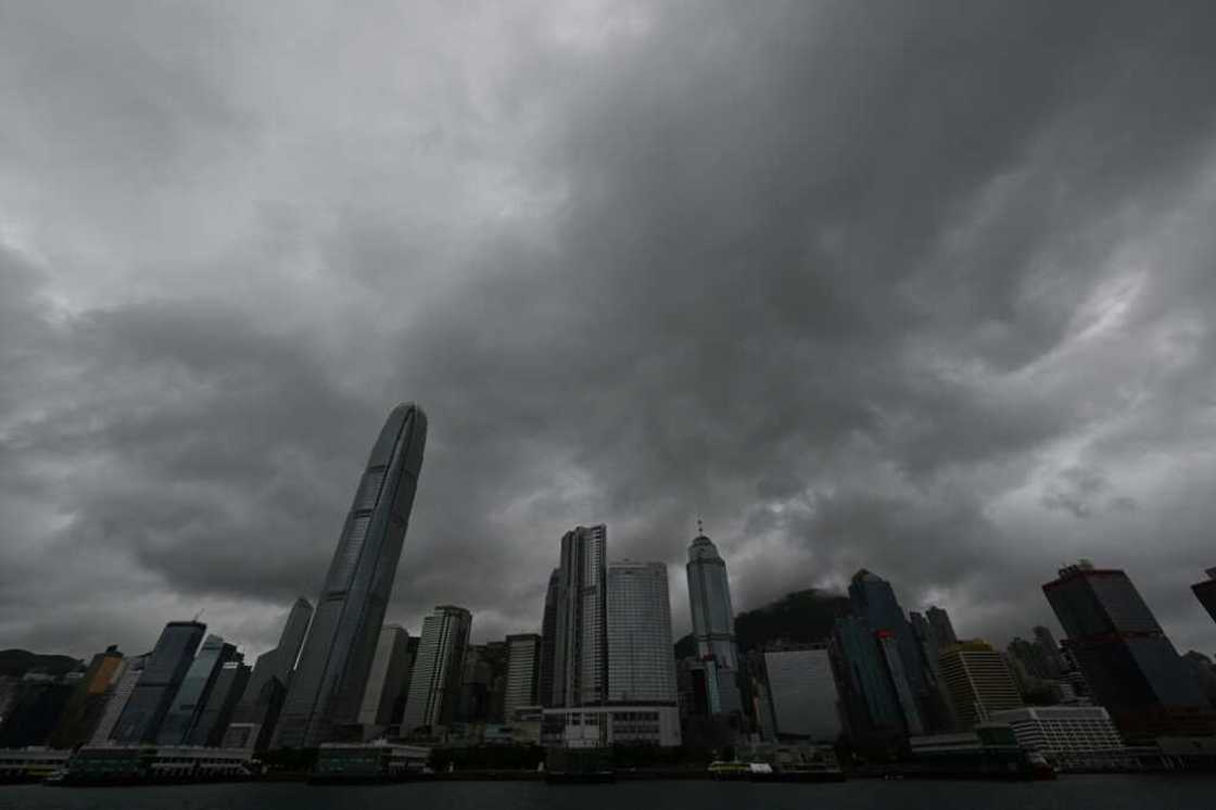 Hong Kong's stock exchange will implement new rules in September to continue trading through inclement weather Hong Kong's stock exchange will implement new rules in September to continue trading through inclement weather