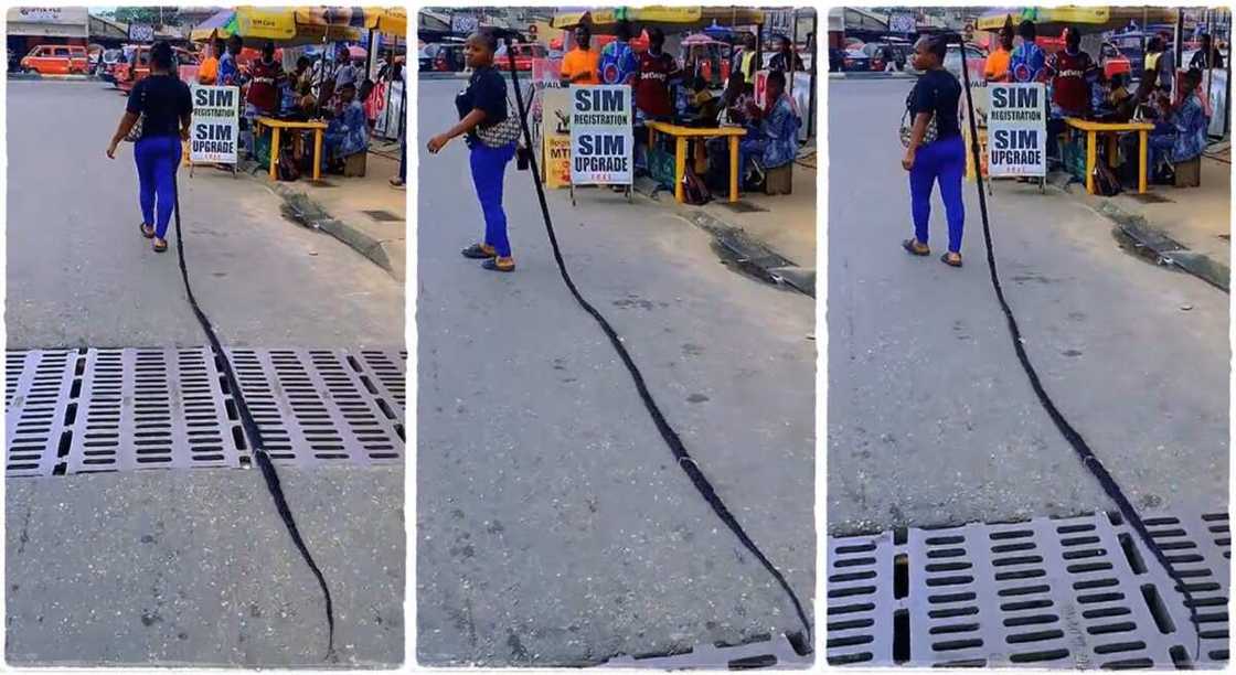 Lady parades the streets with long braids. Lady parades the streets with long braids.