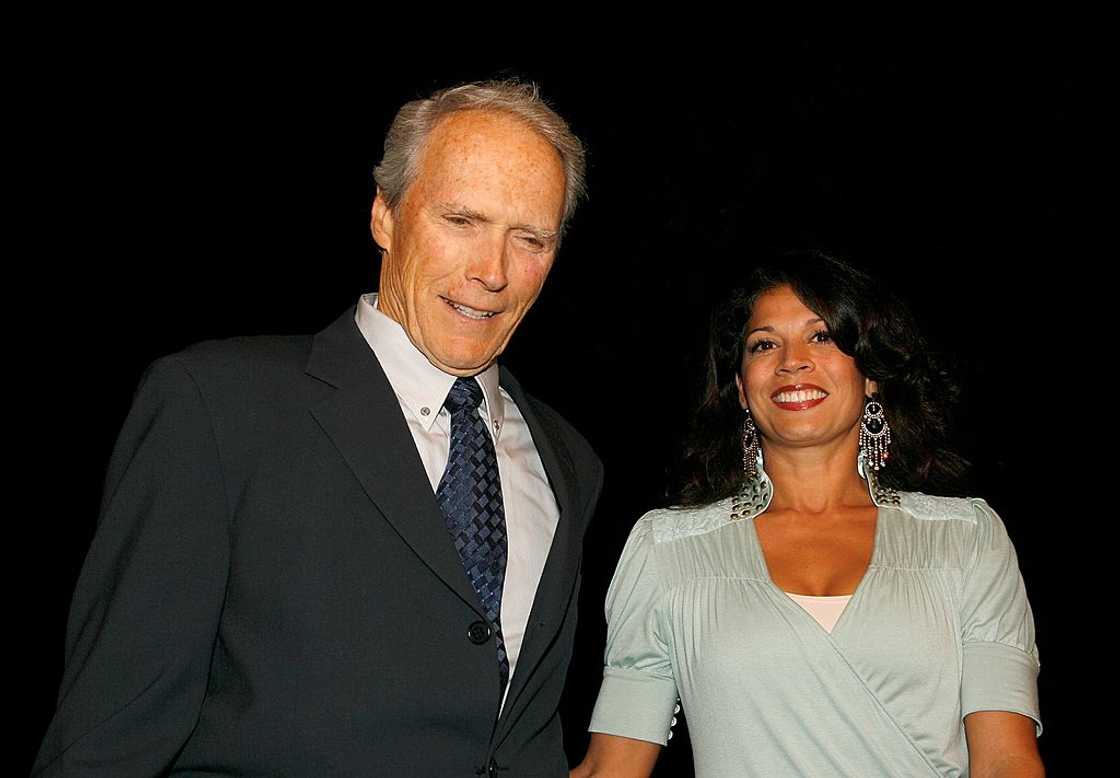 Clint Eastwood and Dina Eastwood attend a film premiere