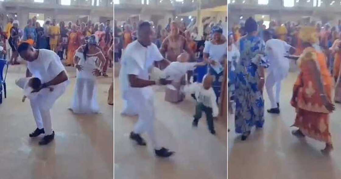 Dad dances with baby in church Dad dances with baby in church