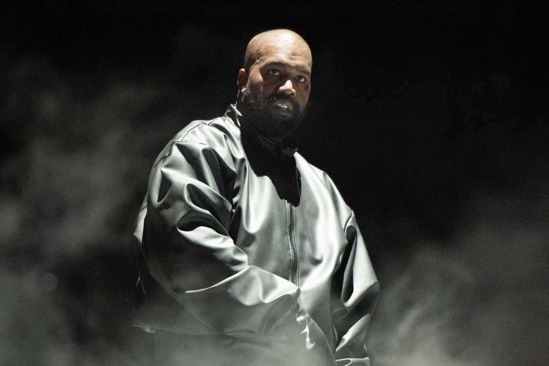 Kanye West performs at a concert