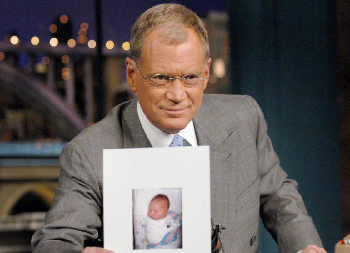 David Letterman holds a photo of his new son, Harry Joseph Letterman on the CBS Television Network David Letterman holds a photo of his new son, Harry Joseph Letterman on the CBS Television Network