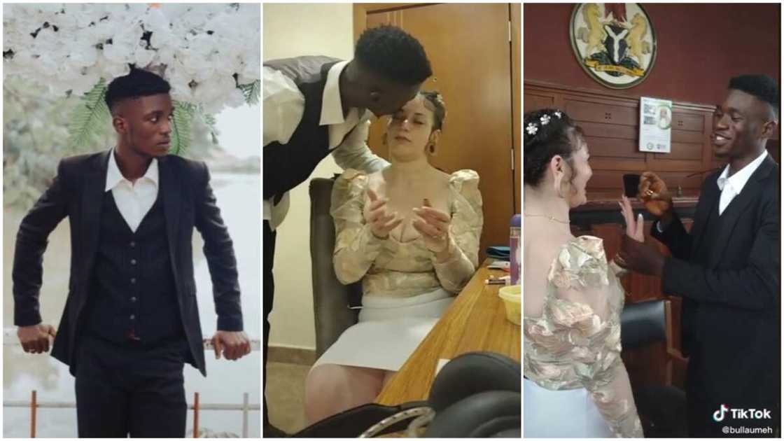 The couple exchange rings in a court room. The couple exchange rings in a court room.
