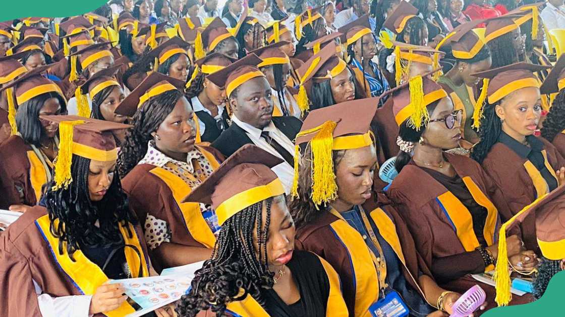 Students attend a graduation ceremony at Augustine University