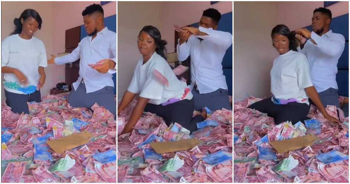 Nigerian couple, new naira notes, pool of new naira notes Nigerian couple, new naira notes, pool of new naira notes