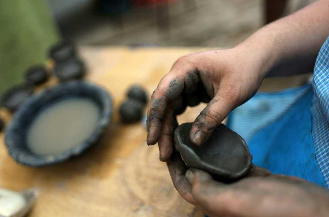 A Chilean craftswoman makes the traditional pottery that UNESCO says is in urgent need of preservation A Chilean craftswoman makes the traditional pottery that UNESCO says is in urgent need of preservation