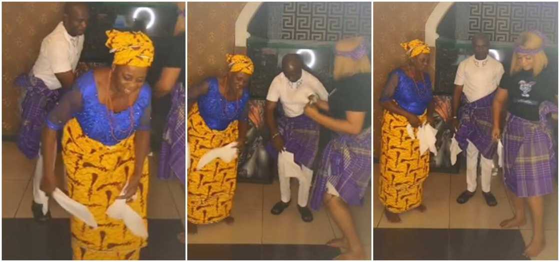 Old woman engages young children in Nigerian waist dance competition. Old woman engages young children in Nigerian waist dance competition.