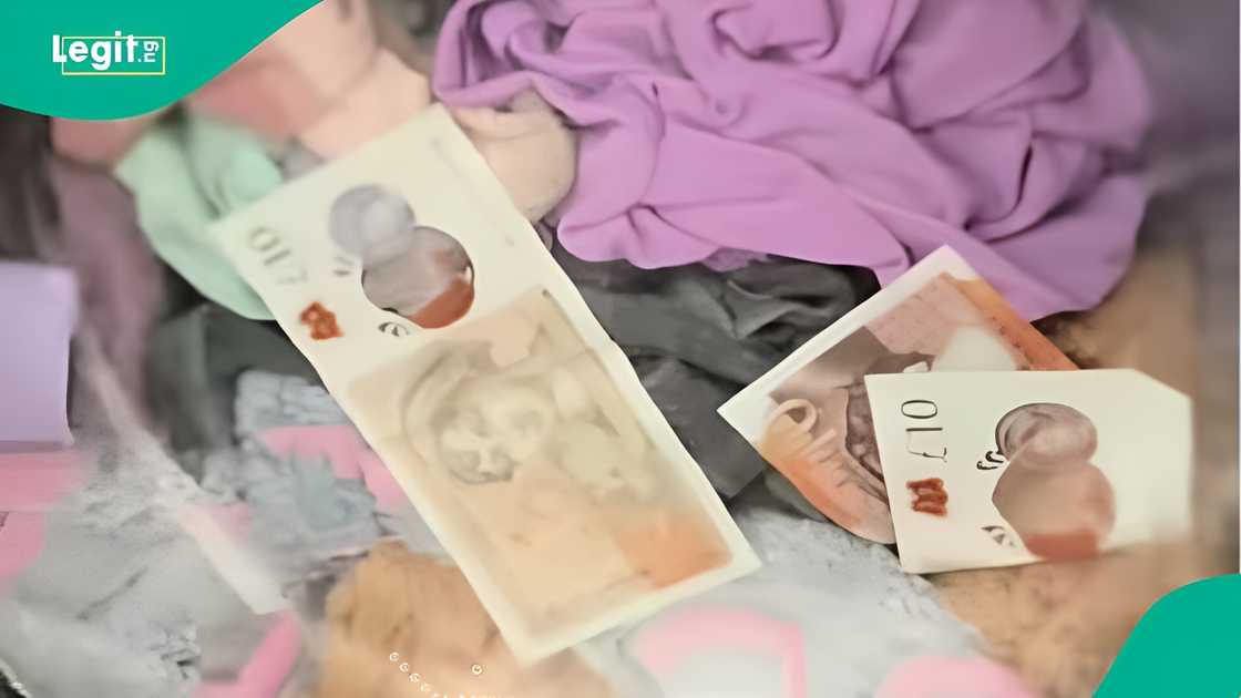 Woman helpless as £100 note spins inside washing machine