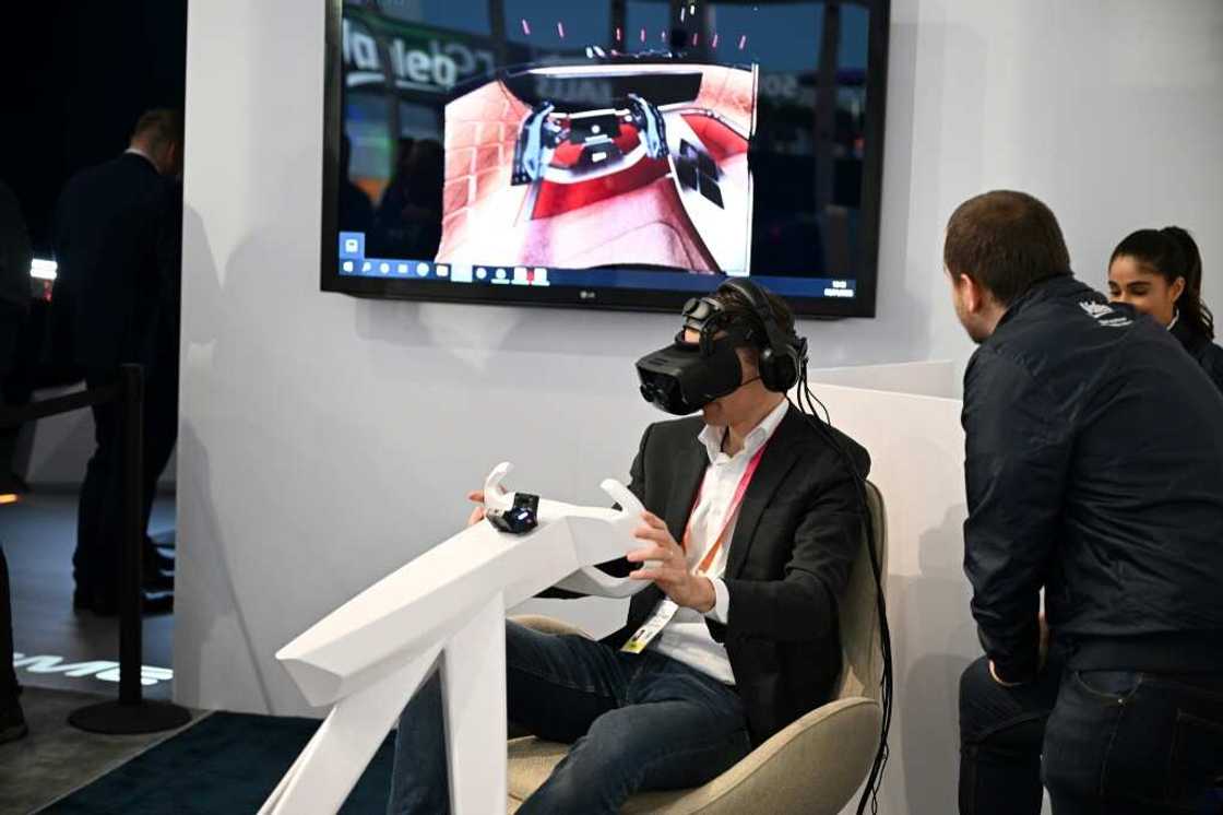 French company Valeo demonstrates the use of a virtual reality headset at the 2023 CES technology show in Las Vegas, Nevada French company Valeo demonstrates the use of a virtual reality headset at the 2023 CES technology show in Las Vegas, Nevada