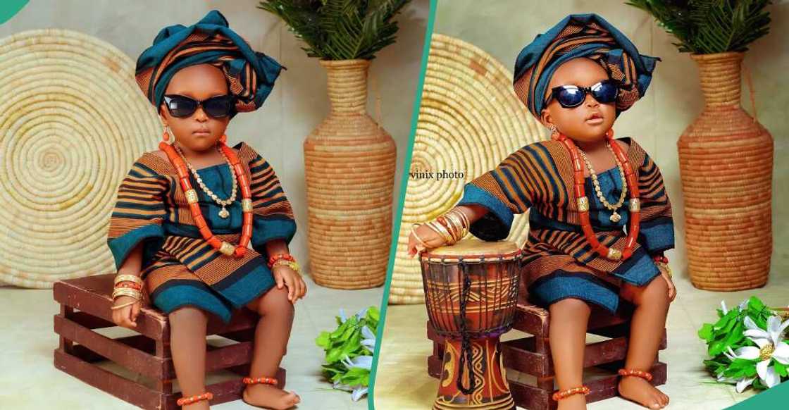 Little girl rocks aso-oke