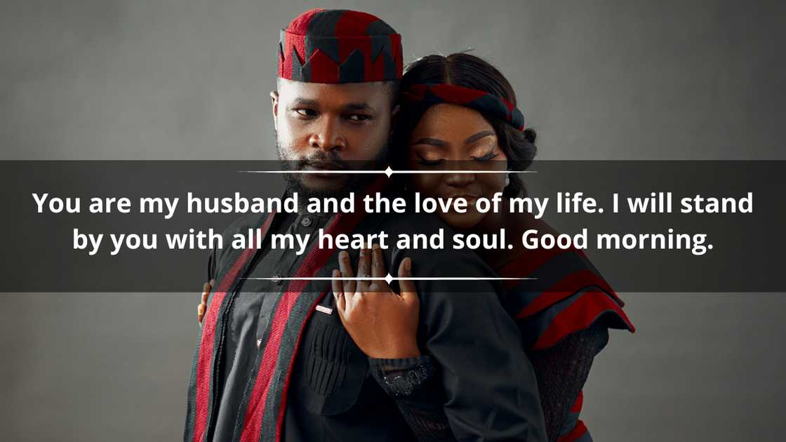 An African couple in traditional clothing is posing for a picture An African couple in traditional clothing is posing for a picture
