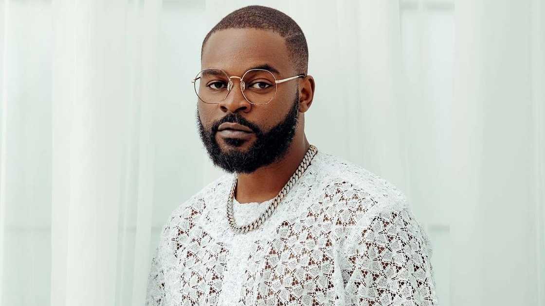 African rapper, Falz poses in a white outfit African rapper, Falz poses in a white outfit