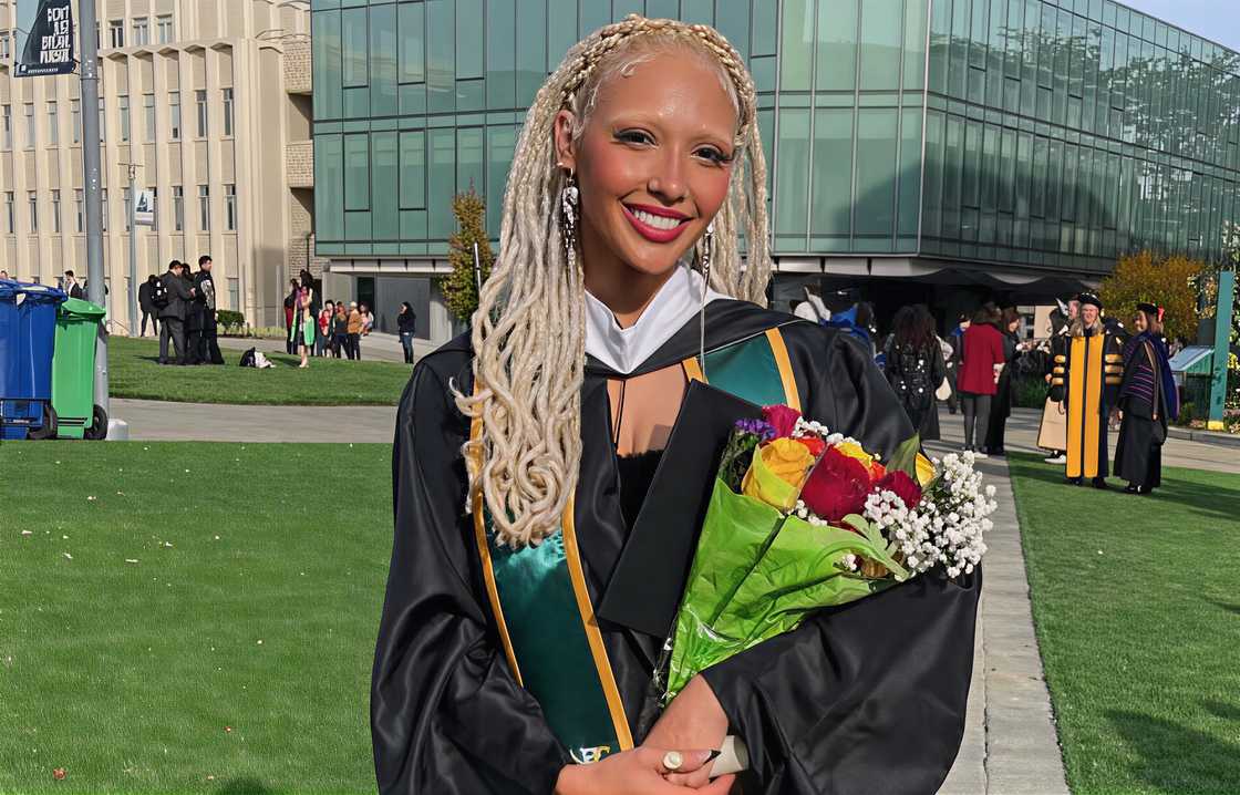 Jaden Clark poses in her graduation gown with flowers at University of San Francisco (USFCA). Jaden Clark poses in her graduation gown with flowers at University of San Francisco (USFCA).