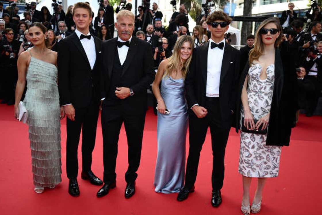 Kevin Costner with his children Annie, Cayden Wyatt, Grace Avery, Hayes, and Lily at the 77th edition of the Cannes Film Festival in Cannes Kevin Costner with his children Annie, Cayden Wyatt, Grace Avery, Hayes, and Lily at the 77th edition of the Cannes Film Festival in Cannes
