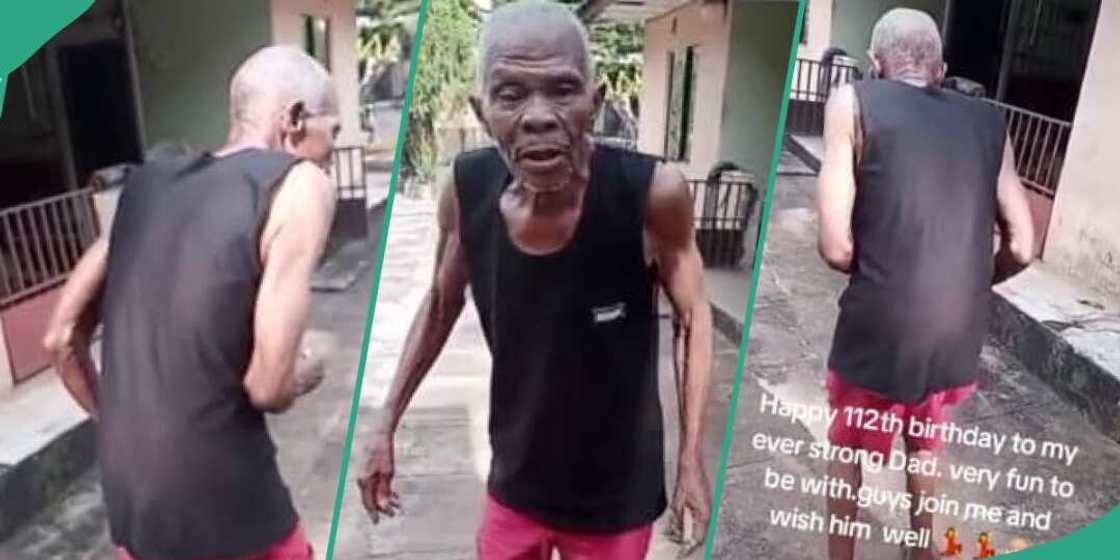 Elderly man dances inside his compound