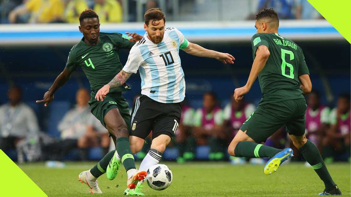 Wilfred Ndidi and Leon Balogun challenge Lionel Messi during the 2018 FIFA World Cup.