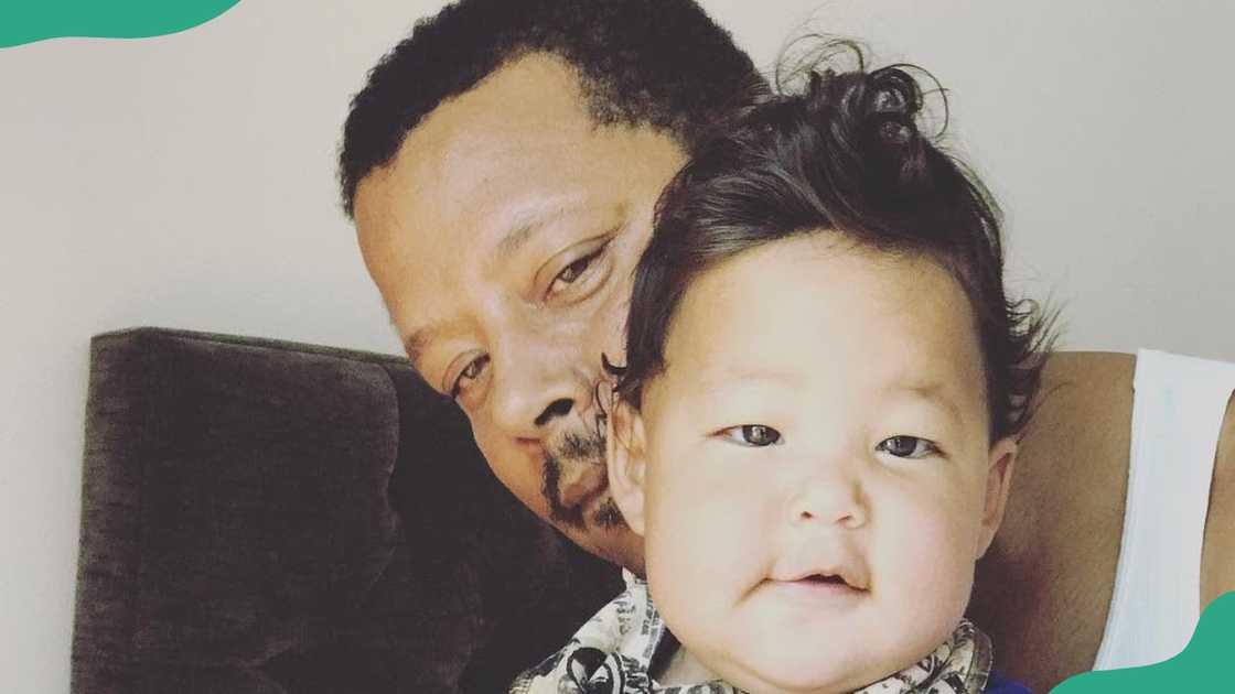 Terrence Howard and his youngest child Terrence Howard and his youngest child