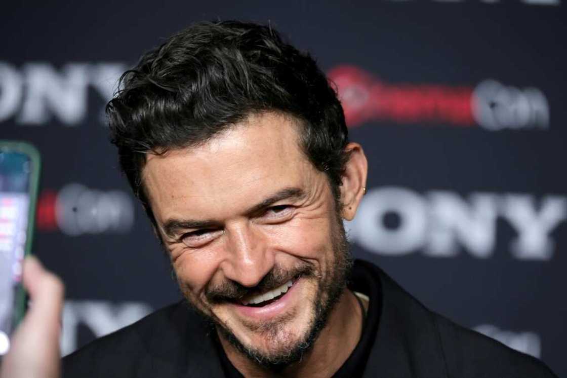 Actor Orlando Bloom is interviewed while promoting 'Gran Turismo' at a Las Vegas event on April 24, 2023; the subsequent actors strike stopped him from doing promotions later in the year