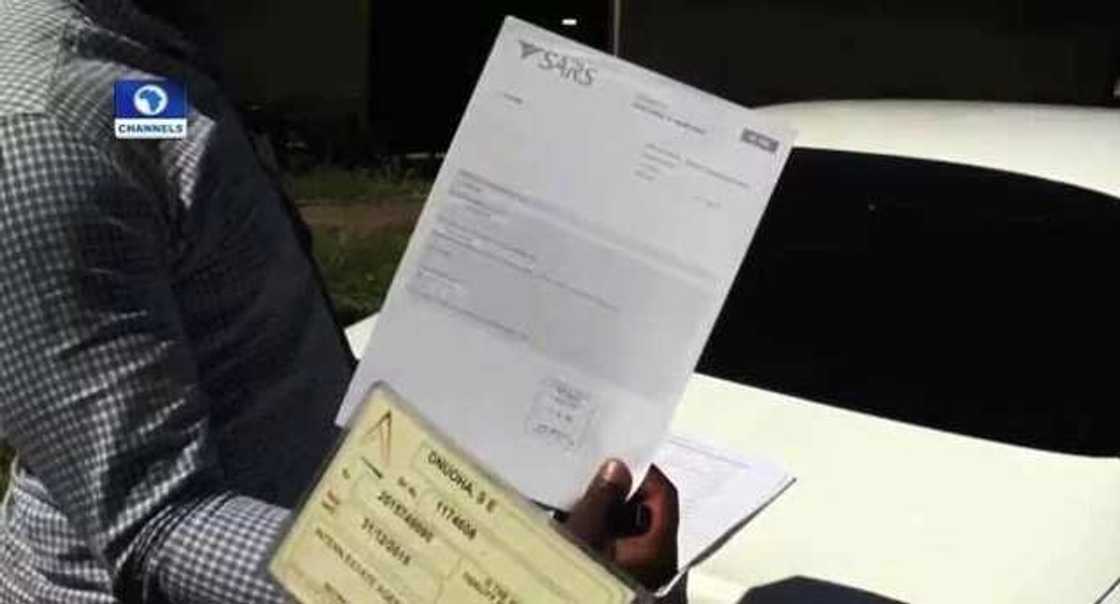 Nigerians estate agent shows documents to proof their business transactions are legal Nigerians estate agent shows documents to proof their business transactions are legal