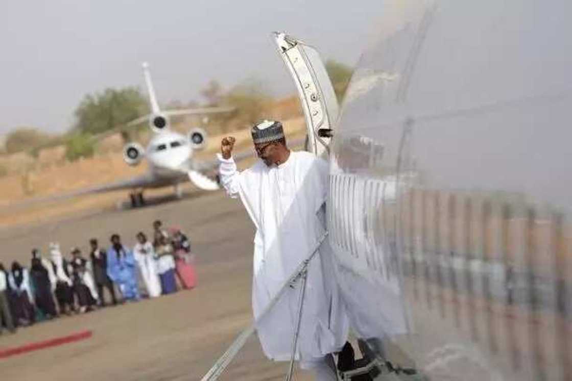 Buhari wave goodbye