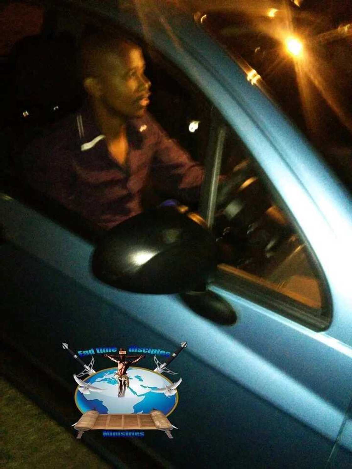 Pastor climbs over his members with car to show God's power Pastor climbs over his members with car to show God's power