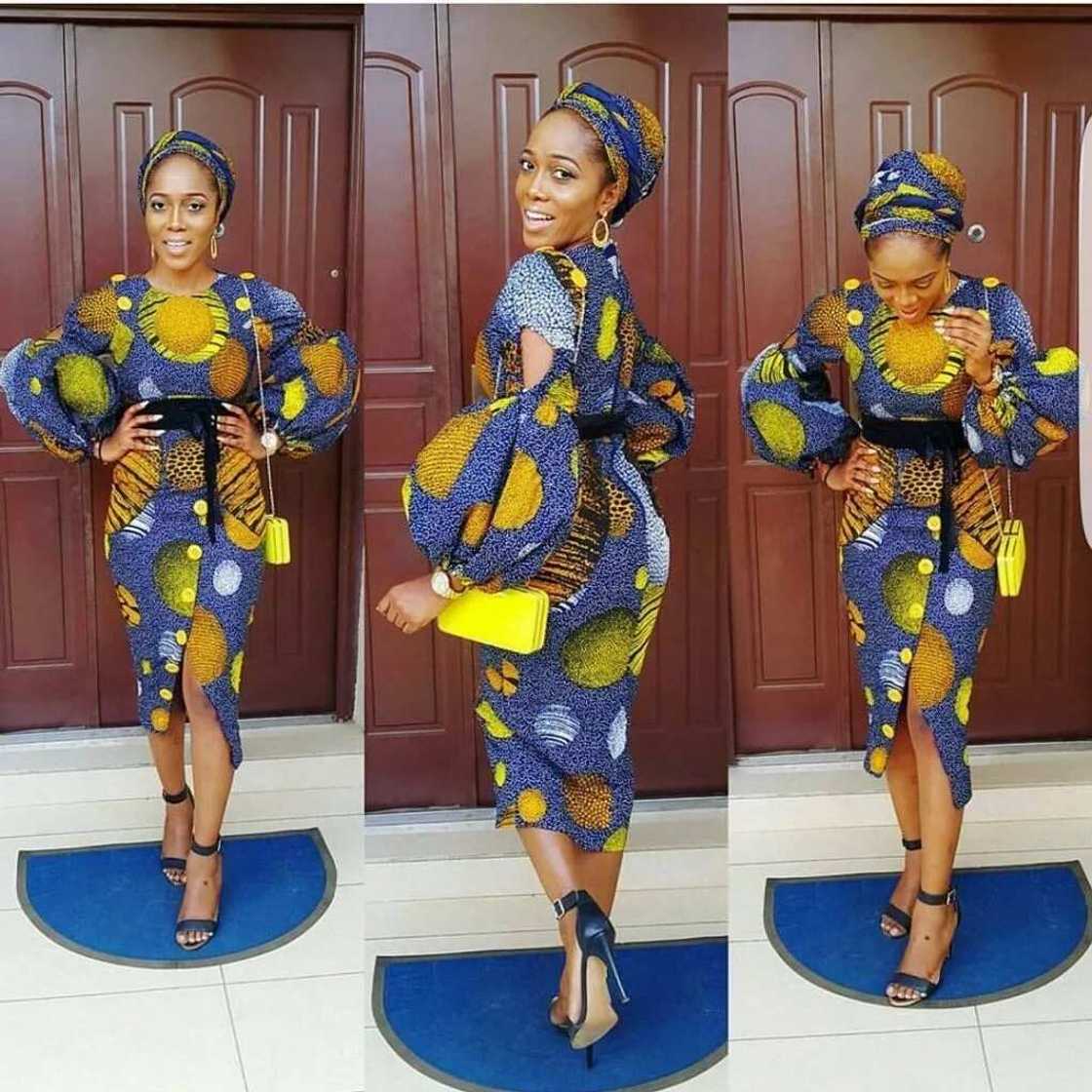 Ankara gown with a belt in a bow form Ankara gown with a belt in a bow form