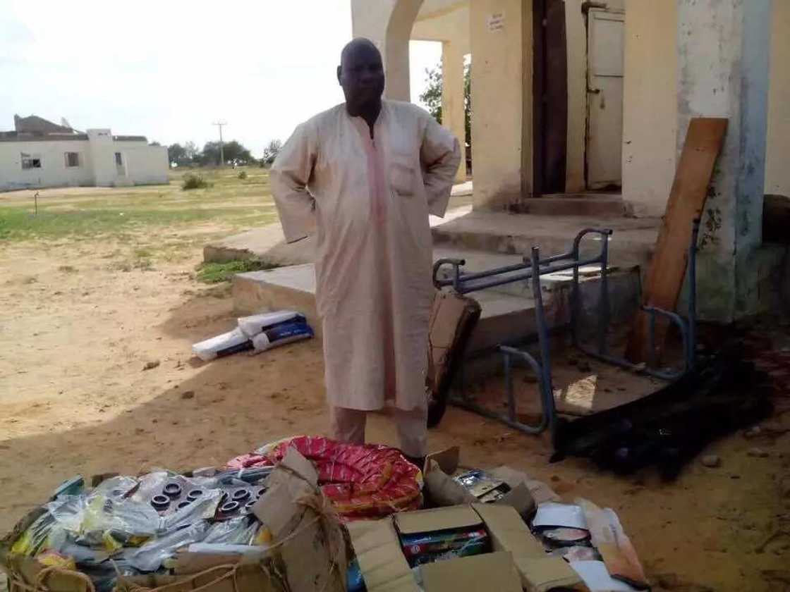 Hassan Yusuf and the recovered items. Photo credit: SK Usman Hassan Yusuf and the recovered items. Photo credit: SK Usman