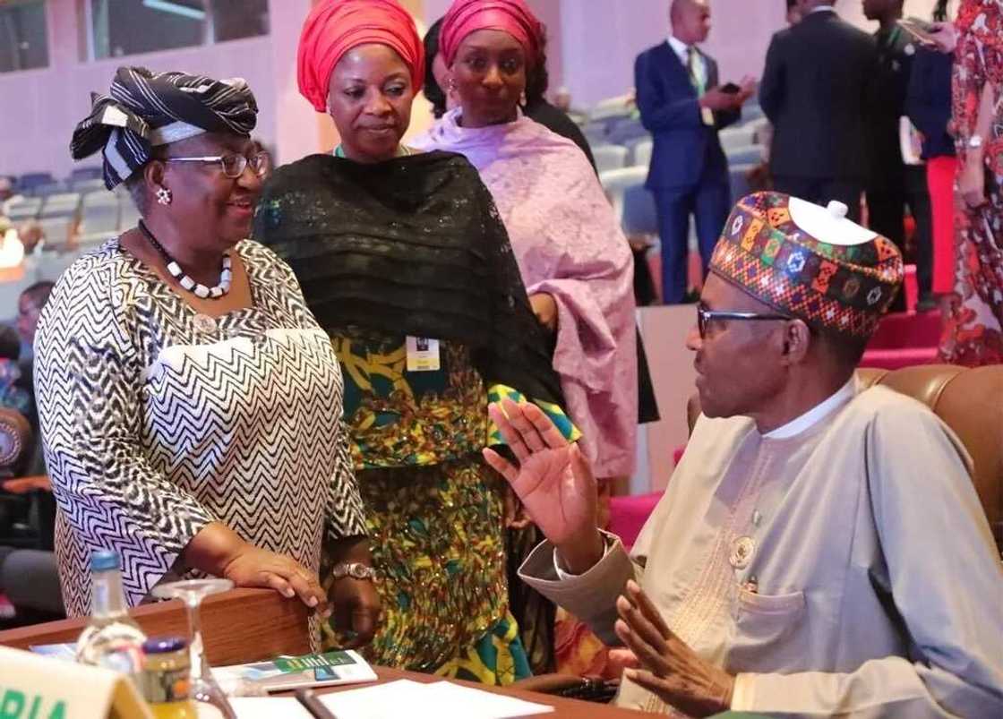 Ex-minister Okonjo-Iweala meets President Buhari at AU summit Ex-minister Okonjo-Iweala meets President Buhari at AU summit