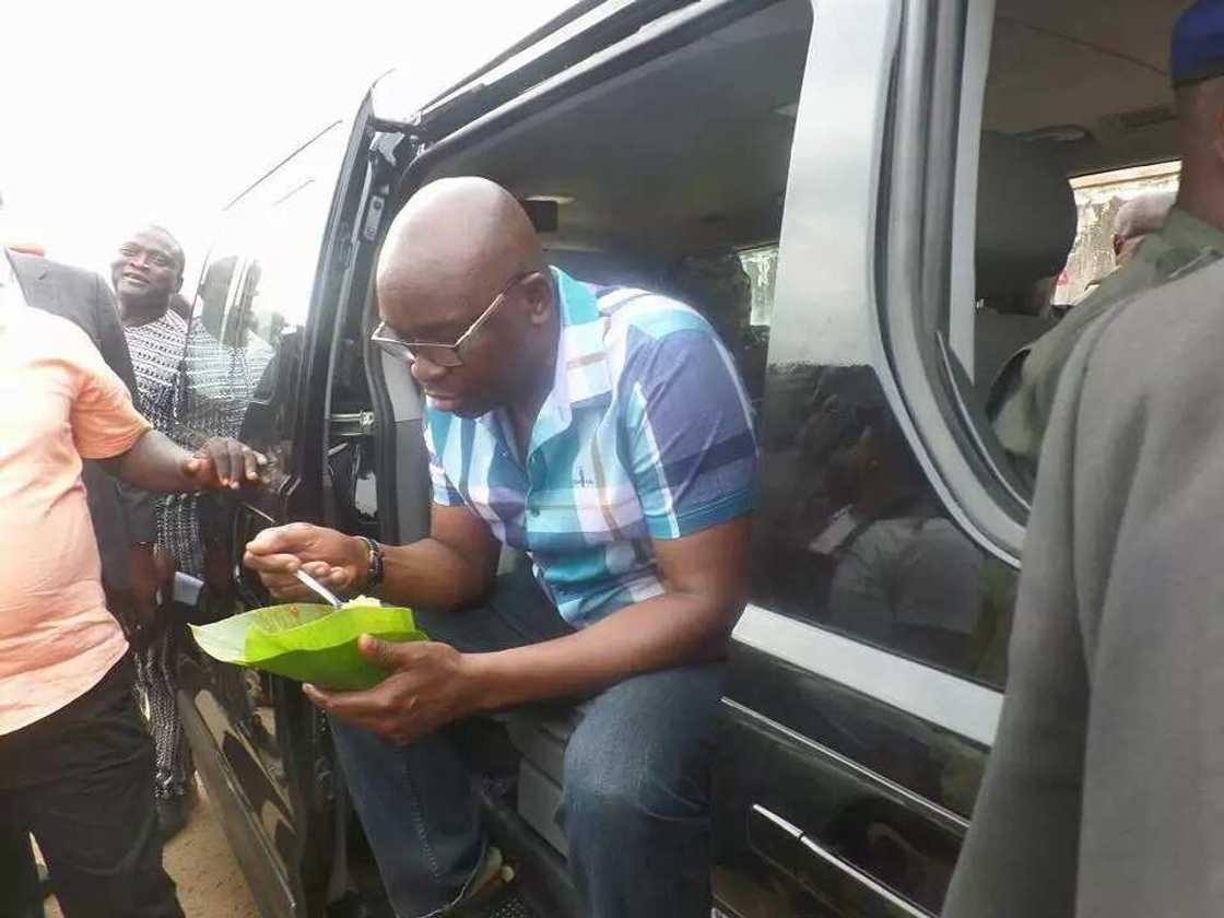 Fayose seen eating rice at road-side canteen Fayose seen eating rice at road-side canteen