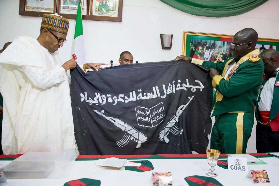 Buhari receives Boko Haram flag Buhari receives Boko Haram flag