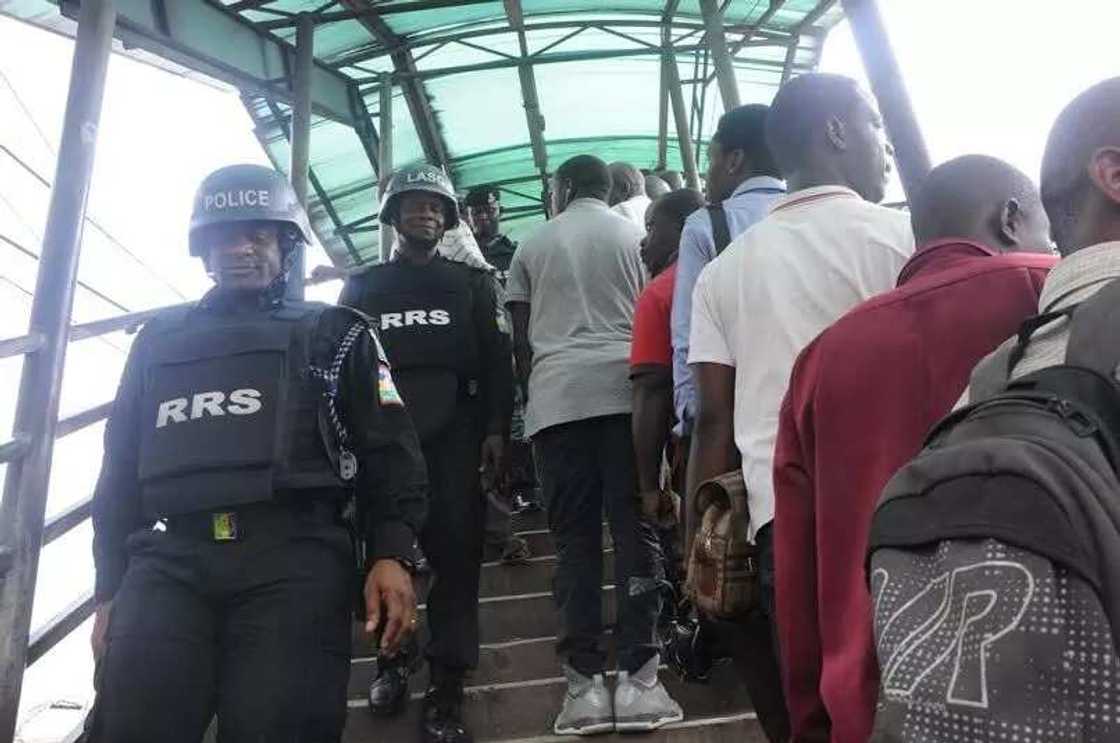 Police maintains law and order at Ojota pedestrian bridge