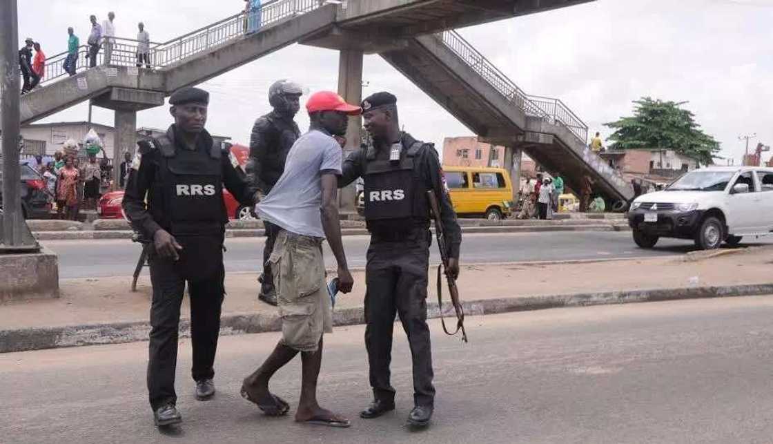 Police maintains law and order at Ojota pedestrian bridge