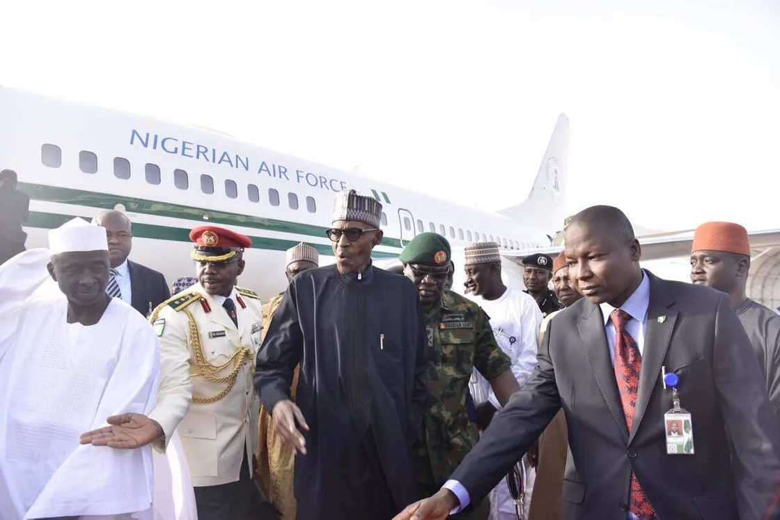 Buhari refuses to answer questions from journalists on return to Nigeria Buhari refuses to answer questions from journalists on return to Nigeria