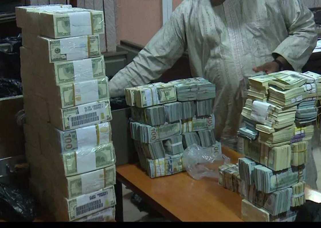 EFCC recovers huge cash in ex-NNPC GMD's secret bunker EFCC recovers huge cash in ex-NNPC GMD's secret bunker