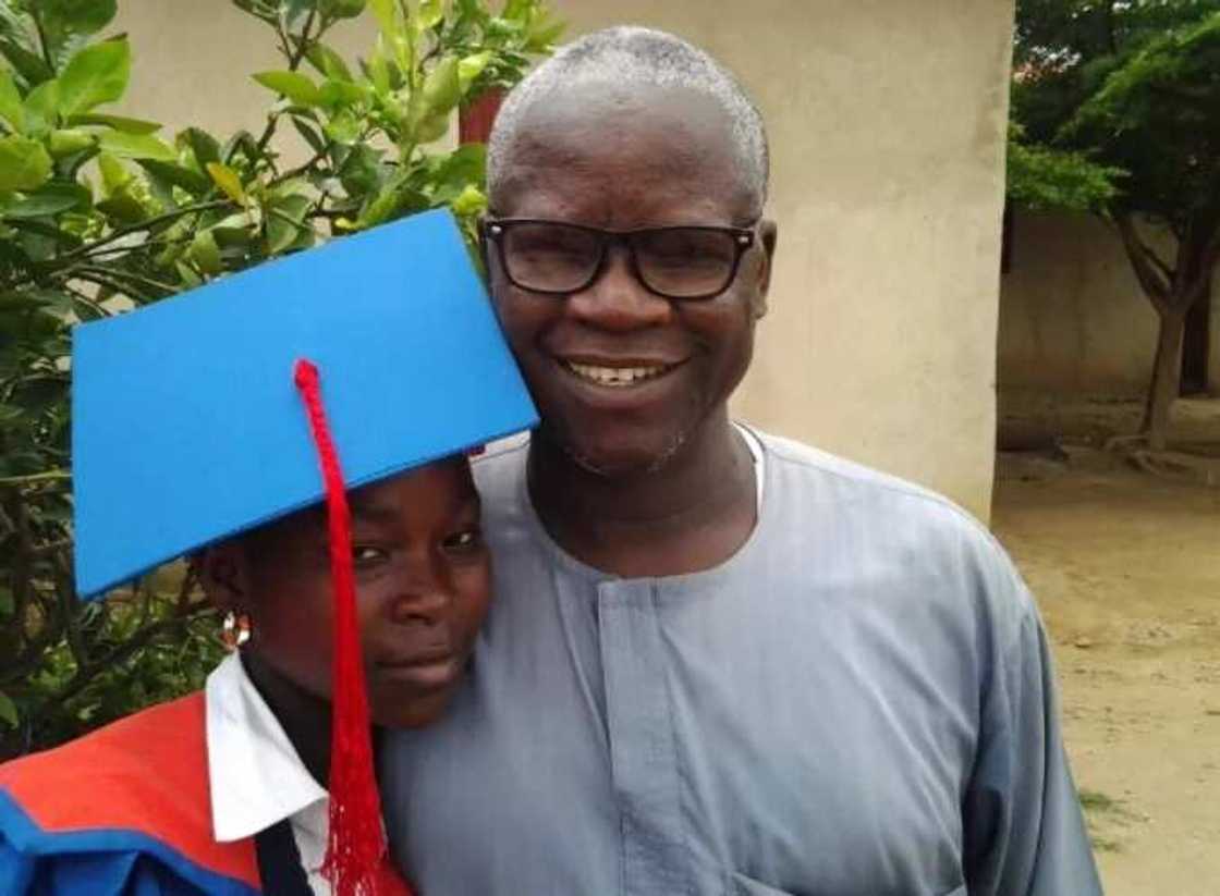 Nigerian single father celebrates his daughter who graduates from junior school (photos)