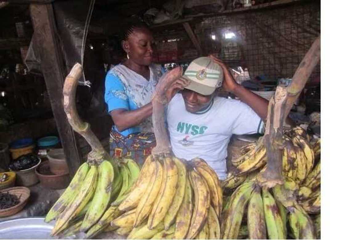 Grateful Nigerian corper shows off mother who educated him