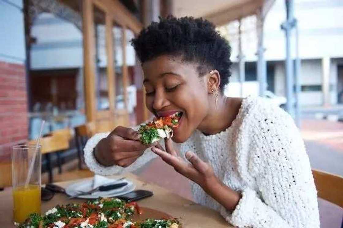 woman with pizza