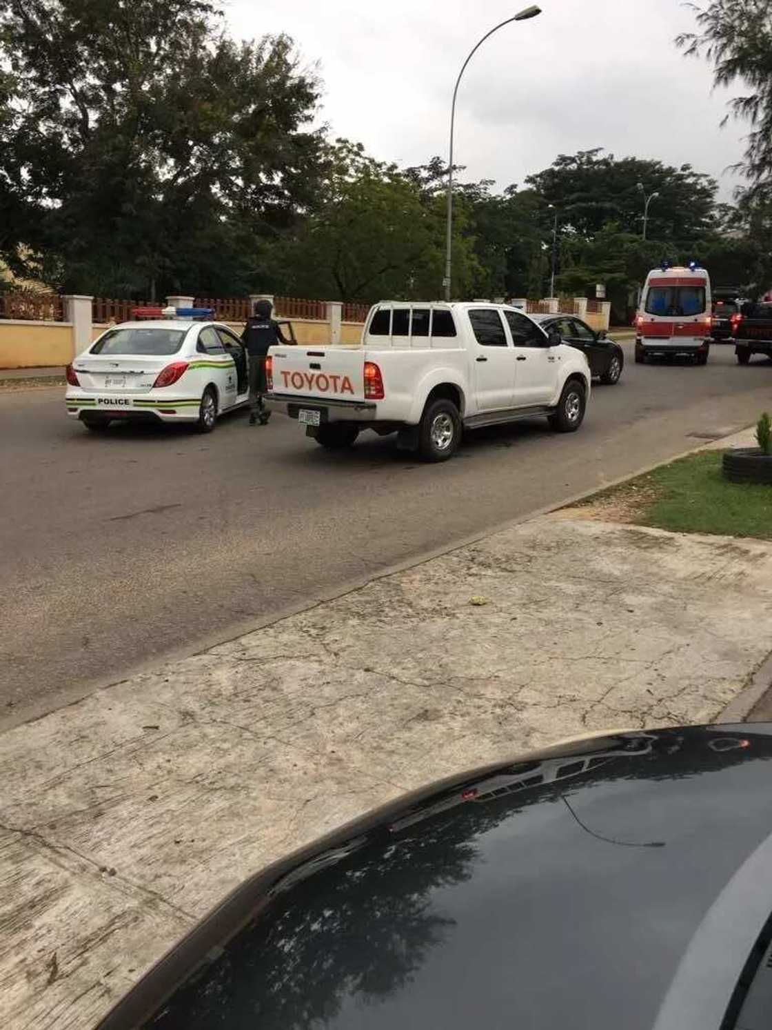 Police cars allegedly blocking the home of the Senate president. Photo source: Bamikole Omisore Police cars allegedly blocking the home of the Senate president. Photo source: Bamikole Omisore