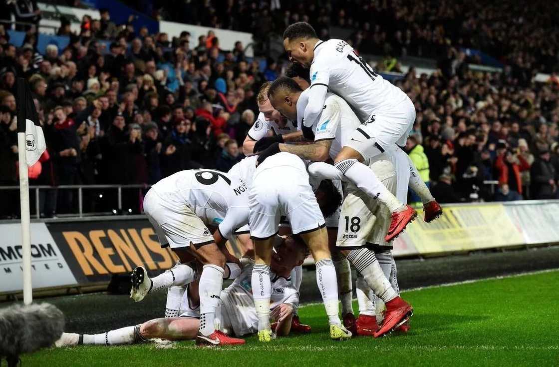 Swansea stun Arsenal 3-1 in entertaining Premier League clash Swansea stun Arsenal 3-1 in entertaining Premier League clash