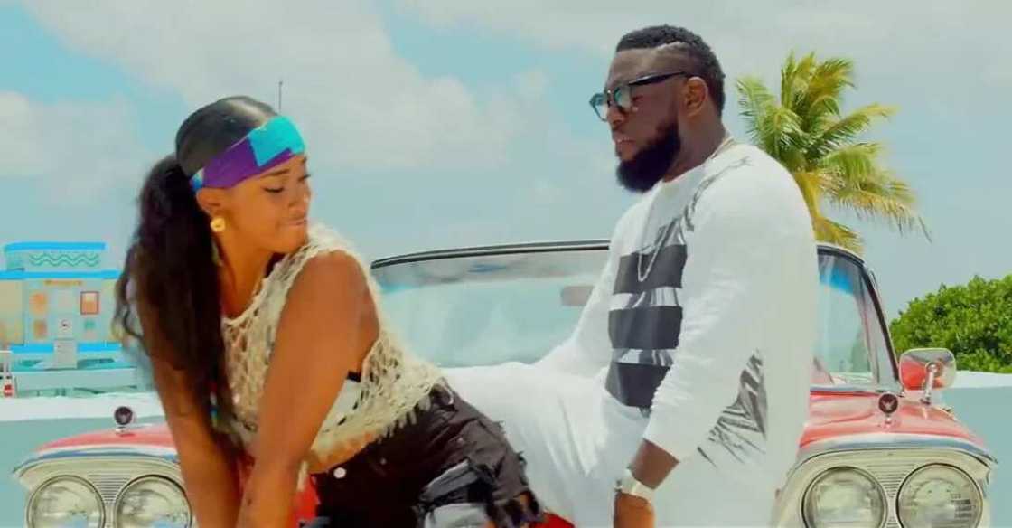 Timaya and hot chick in video for Timaya's new single Timaya and hot chick in video for Timaya's new single