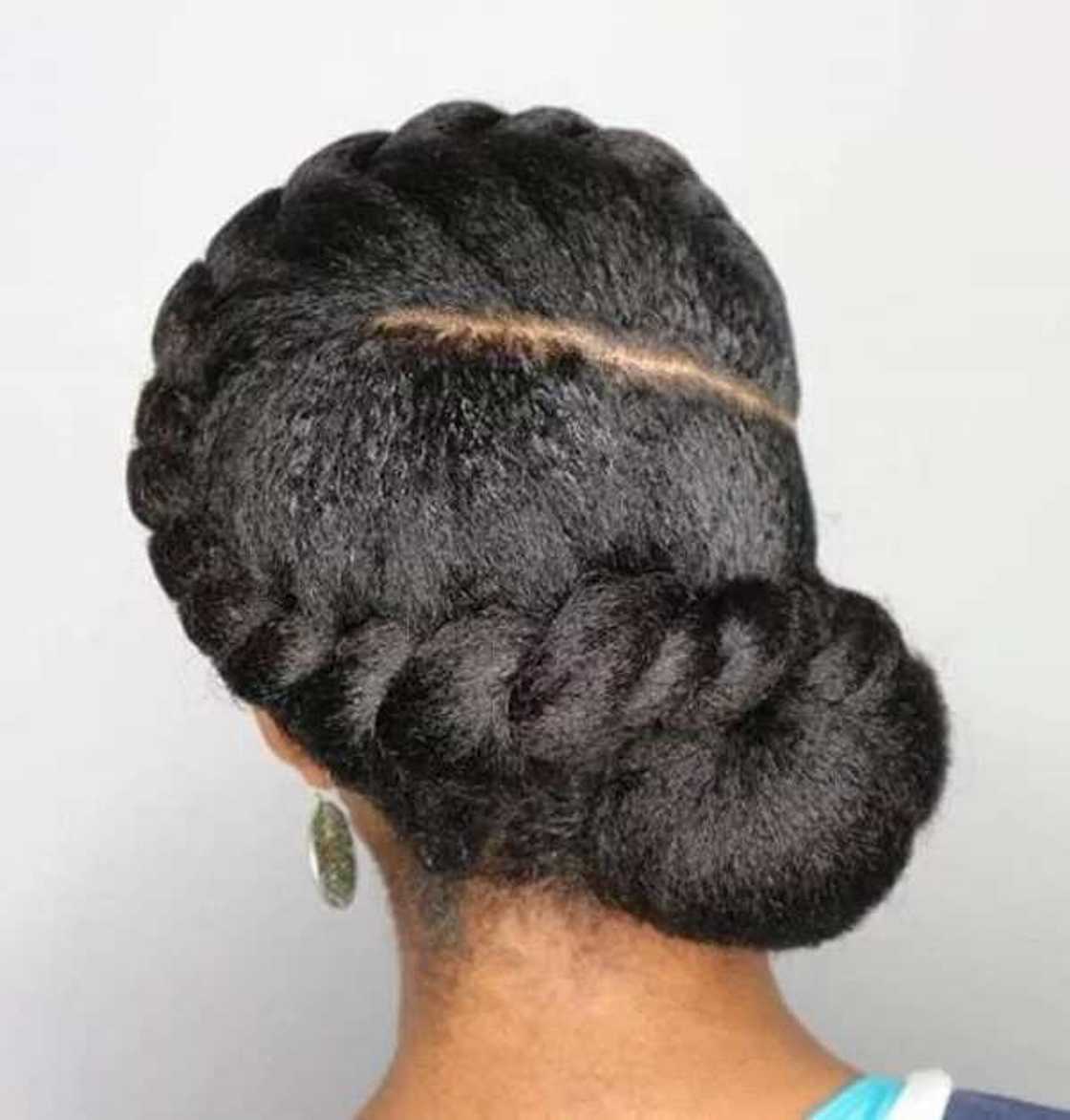 Asymmetrical twist braid as a side bun Asymmetrical twist braid as a side bun