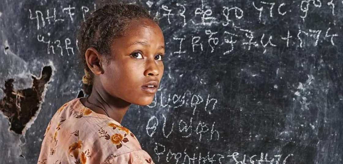 girl at the blackboard