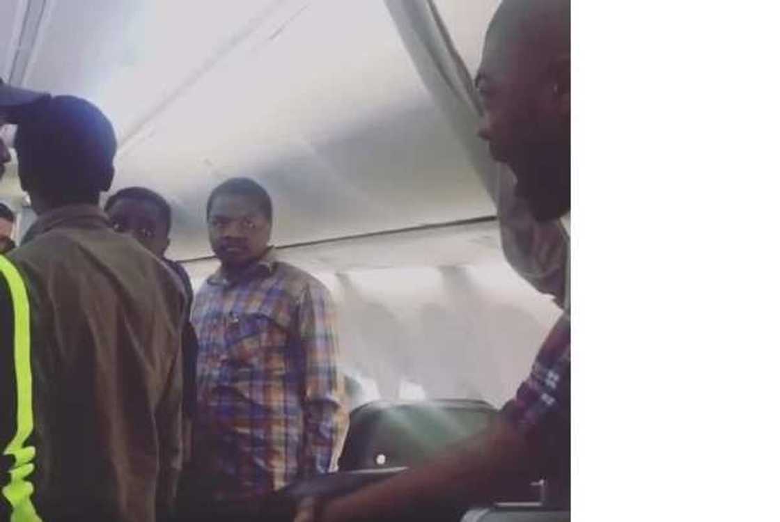 Nigerian lady kicked off Turkish flight for assaulting air hostess (photos, video)