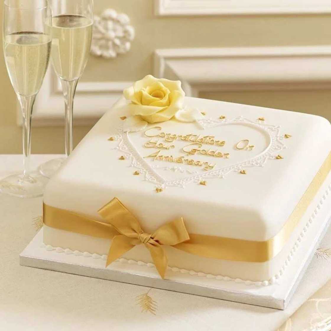 Golden wedding anniversary cake with names Golden wedding anniversary cake with names