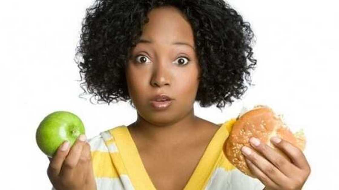 woman chooses food woman chooses food