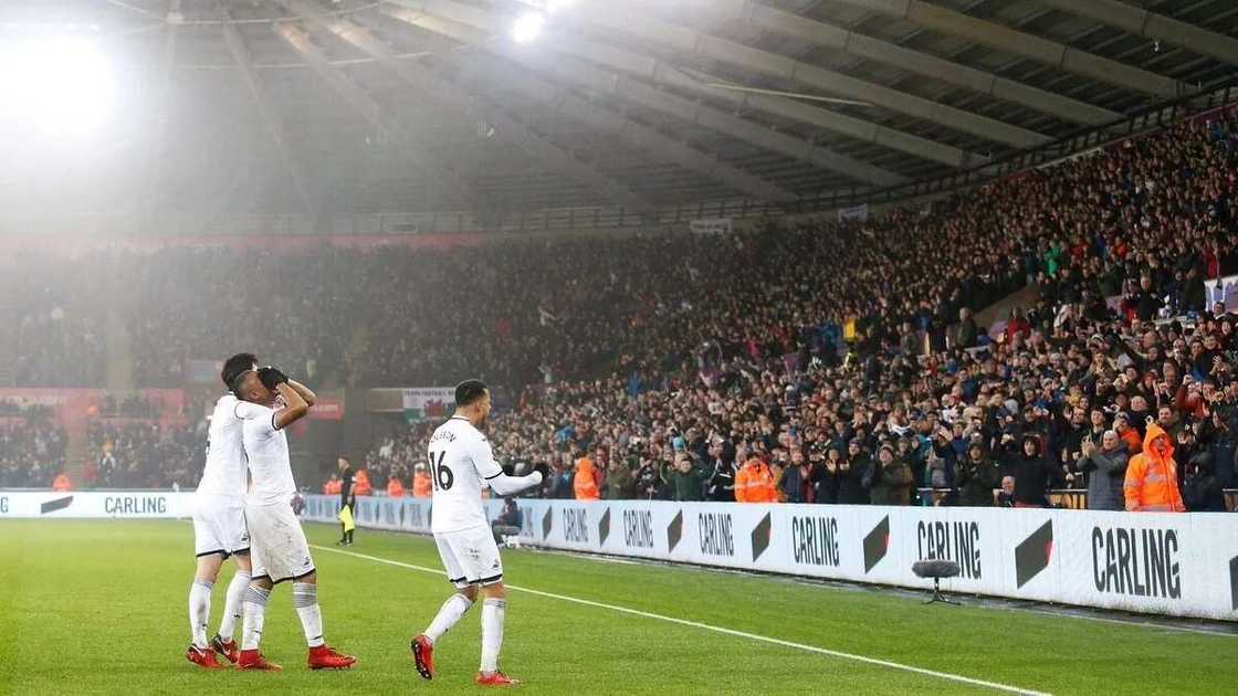 Swansea stun Arsenal 3-1 in entertaining Premier League clash Swansea stun Arsenal 3-1 in entertaining Premier League clash