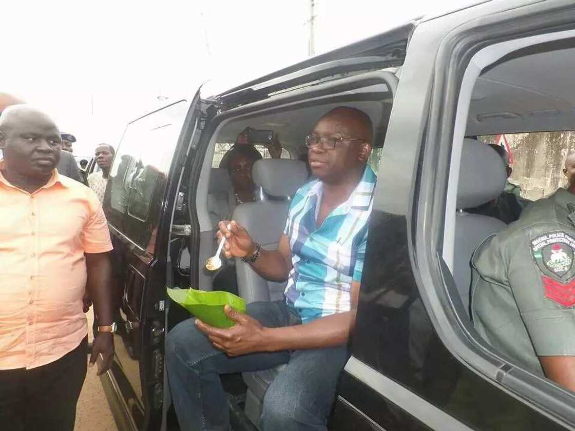 Fayose seen eating rice at road-side canteen Fayose seen eating rice at road-side canteen