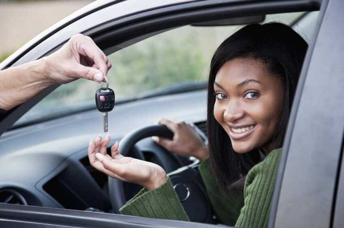 A woman in a car