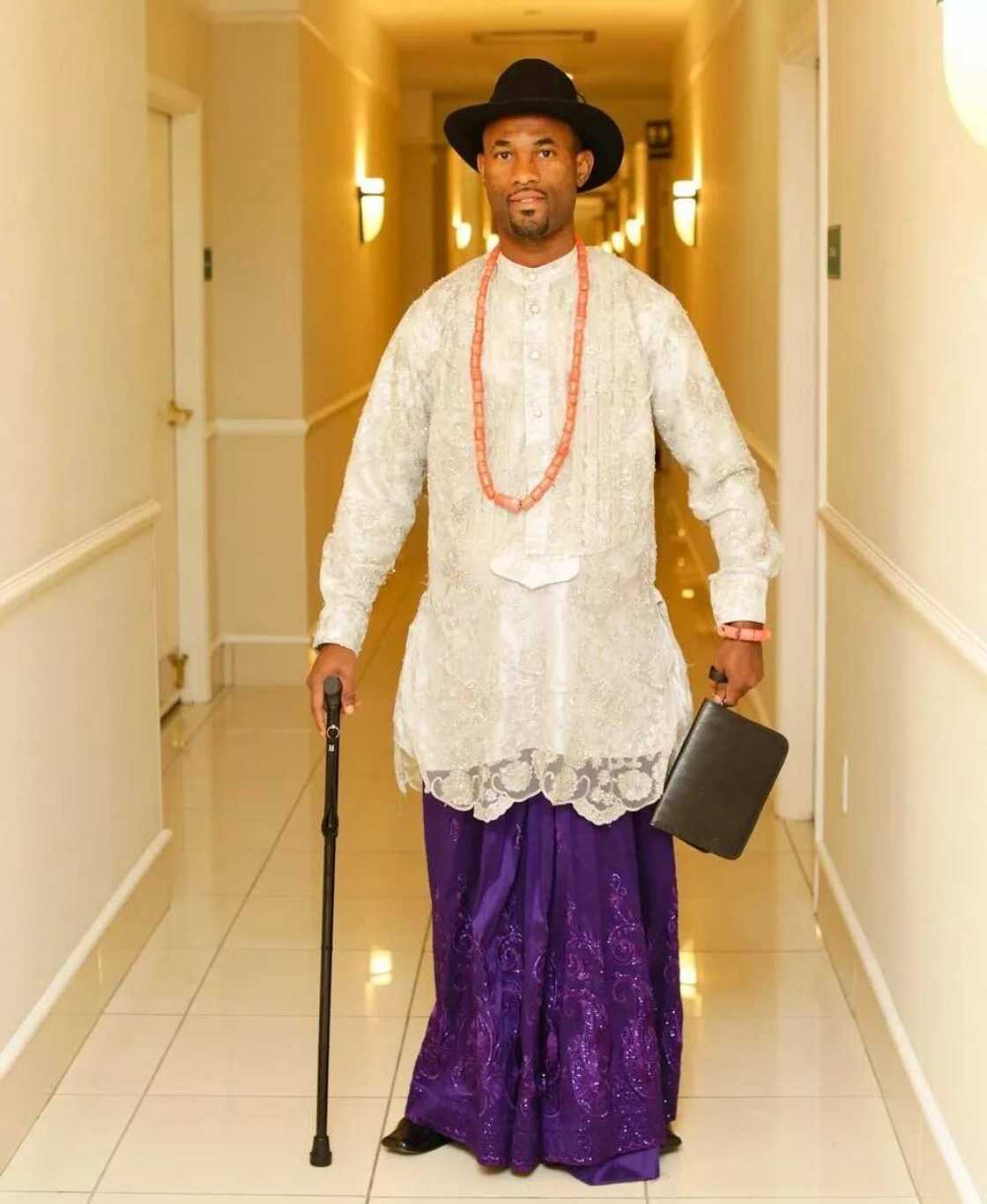 Edo male traditional attire with hat Edo male traditional attire with hat