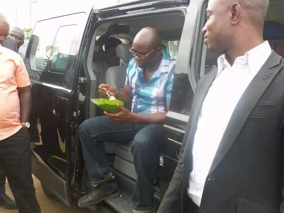 Fayose seen eating rice at road-side canteen Fayose seen eating rice at road-side canteen